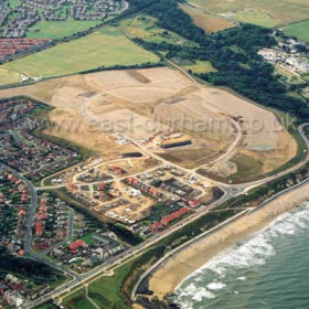 Tempest Rd, Dene House Rd and North Rd at bottom left, Building just starting on the new East Shore Village in July 2003. Seaham Hall at top right.Copyright FlyingFotos www.seahamfromtheair.co.uk