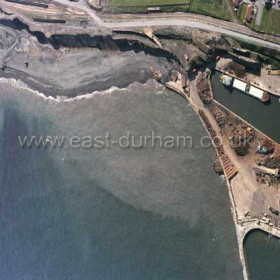 Immediately south of Seaham Dock and just north of Dawdon Colliery showing filthy beach and polluted water in the late 1980s.         Copyright FlyingFotos  www.seahamfromtheair.co.uk