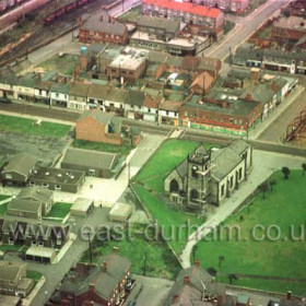 St John's Church, Blandford Place and Church St about 1980.At right, new supermarked being built on the site of the former National School.