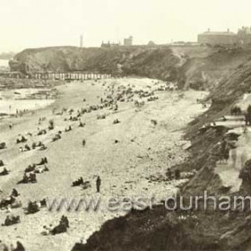 Beach around 1933, Joiners shop built in 1923 to right soon to collapse into the sea. Gun platforms in front of building breaking up and falling to the beach,beach railway soon to be demolished.