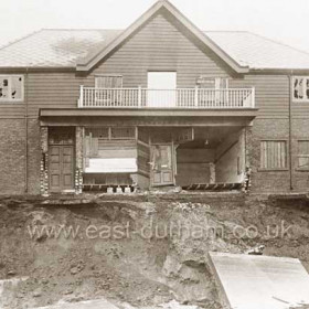 Joiners shop uninhabited and vandalised in the winter of 37/38 shortly before collapsing into the sea in 1938. The old gun platforms visible in foreground.