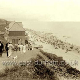 Joiner's Cafe in the early 1930's. Built in 1923 it was swept into the sea in 1938, note the old gun emplacements in front of the shop.