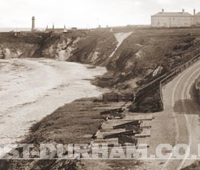 Battery and munitions house in the foreground. Photo late 1800s