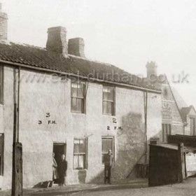 Foundry Houses from the road to the Subway. Ropery Walk School behind. Photograph c 1930. Demolished c1935