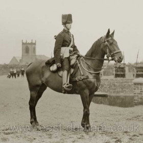 Volunteer with St John's and Emily st stable yard behind in 1870