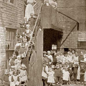 Hawkey's Yard in Back North Railway Street in 1925. Hawkey's Yard comprised of about 6 houses inhabited by a dozen families, built by Thomas Hawkey in the 1830s it was the subject of a closing order in 1929 and demolished in the early 1930s. You can see the exact location of this yard at Streets/Central Area Index No 22.