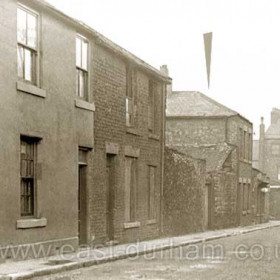 Nos 11-14 North John Street. The Kitty, (arrowed) was Seaham's first police station, built in the early 1840s it consisted of an office, two cells and living accommodation above. It was converted into a soup kitchen in the early 1860's Demolished 1915, date of photograph not known.