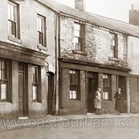 The southern end of Back North Tce, (near Noah's Ark), R K Wade's butcher shop at extreme right. He took over the shop c 1899 and traded there at number 3 until around 1930.   At No 4 Elizabeth Kent sold fish and chips in 1899 with John Butters, bootmaker, also working from the same address. By 1910 Thomas Walker owned the fish shop.  At No 5 Ann Nelson is listed as a shopkeeper in 1899 with Richard Saunders operating as a boot repairer from the same address, in 1910 Richard Taylor owned the shop.    No 6, just visible at left of frame was also a fish and chip shop from around 1914 until the time of this photograph c 1930.