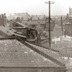 Looking west up the rear of William St c 1930, demolished 1934. The houses at right were Back William St and the building between the lamp posts was still standing or at least parts of it were in the mid 1950s if derelict, adjoining the yard of Rutland House in Tempest Road. Buildings running off to left where road narrows were Back Henry Street. The high building on skyline is the Co-op building and the high building at right is the Methodist Chapel in Tempest Rd.