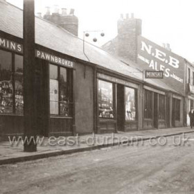 Minski's Pawnbroker,Jeweller and Draper, Clothing Store and Sale Rooms at 4,5 and 6 South Railway Street from around 1900 until ( WW2 ? ) Duke of Wellington at right.Photograph  c 1925