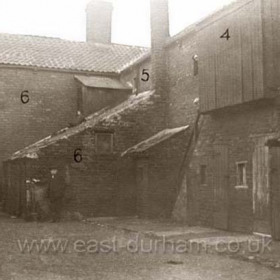 The north side of Summerson's Buildings yard in Back Henry Street c1934