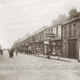 Church St before 1934Edgar Archibald Newsome began trading as a wine & spirit dealer between 1910/14 became Newsome Bros in the late 20's and continued until c 70's.FW Armstrongs chemists shop traded here from c 1920 (1915-1920), was still here in 29 but had relocated to The Ave Deneside by 1934. Also the dwelling hse next door to Newsomes (at right) was H Hutchinsons first jewellers shop by 1934.Junction with Adelaide Row to left and Caroline St to right.