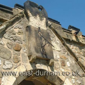 The sundial above the portch dates from 1773. The inscription above it reads...I am natural clockwork by the mighty OneWound up at first, and ever since has goneIts pin (') drops out, its wheels and springs hold good;It speaks its Maker's praise, though once it stood,But that was by the order of the workman's power,And when it stands again it goes no more.