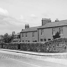 William St on the Mill bank, demolished by 1960. Note the cobbled strip at each side if the road, probably to provide grip for horses, all motor traffic tended to drive in the centre , cobbles were not removed until the mid / late 60's.