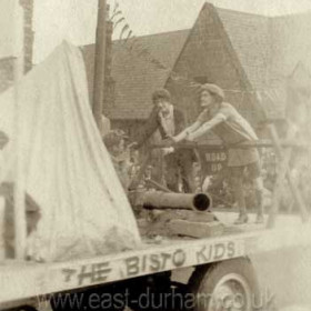 The Dawdon Pageant of 1934, parade here turning right from Church St into Blandford Place. National School in background.