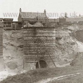 Lime Kilns (1862-1918) at the eastern end of the Green Drive Dene, between Dawdon Hill Farm and Dawdon Colliery  supplied Blast Furnaces and Chemical Works and probably lime for the building of the village of Dawdon itself.. Vane House and railway in background. The situation of these kilns is shown well in the Seaham Model section.