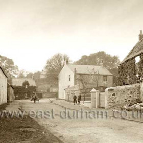 Looking east through Dalton le Dale around 1900. East and Hornsby's Farms, the sexton's cottage, Rose Cottage right of centre (demolished 1912) and the old vicarage at right, (demolished mid 60s)