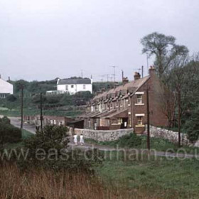 St Andrew's Terrace on the site of the former Colpitt's Farm with Times Inn and blacksmith's cottage behind, photograph around 1960.