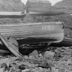 "Village Queen" among other wrecked cobbles on Terrace Beach. 31/1/1953