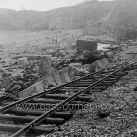 Terrace Beach railway, a relic of the 1899-1905 South Dock extensions mangled by the sea. 31/1/1953