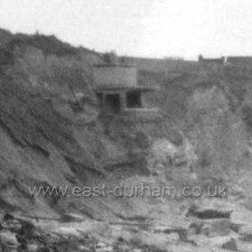 Detail from previous photograph showing WW2 searchlight station built into cliff. 31/1/1953