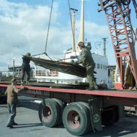 Unloading sheet steel from a ship in the South Dock c1980.