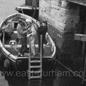 Diver Jim Patterson about to inspect dock gates in 1961.