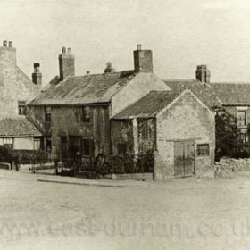Liberality Tavern at left.