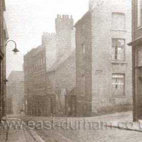 Church Street looking north, shop at right owned by Thomas Tugman.

N Kirtlan