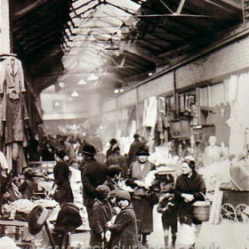 East End indoor market.
The old market ran off High St East and was opened in 1830. The result of packing  meat, vegetable and old clothes stalls in an enclosed space in the days of open drains and cess pits can only be imagined and even in the 1930s a walk through the market gave some impression of health problems. Perhaps helped by the depression the market remained very popular but it was eventually demolished during slum clearances in the 1950s.    
Information from Len Charlton. Photograph from Ally