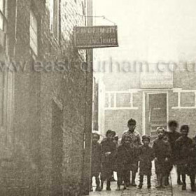 Mill Lane.
The area round High St and Low St were full of “common lodging houses” catering for seamen from the docks nearby as well as casual workers. J.M. Denmott seems to set up a defence line to prevent B.Taylor getting any trade.
Photograph Norman Kirtlan, information from Len Charlton.