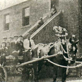 Robinson Carter, driving his cart to the East End Carnival around 1900. 
 Photograph sent in by ANAZB.