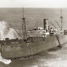 The American ship "West Hika" which ran aground on rocks off Easington on Jan 15th 1936.
Between the 15th and the 20th the lifeboat attended the ship 5 times but the crew refused to leave, eventually the coastguards brought all 38 crew members ashore by breeches buoy, the ship was not refloated until 9 months later.