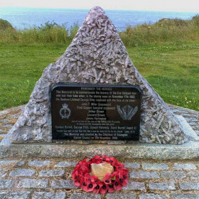 Memorial to Seaham Lifeboat "George Elmy"
Saturday, 17th November 1962 brought tragedy to Seaham.
At 4-10 pm the George Elmy was launched to the rescue of the fishing boat "Economy", floundering off Dawdon Colliery in a gale getting up to force 8 with waves up to 12 feet high.
At 4-15 pm they radioed that they had taken the 5 crew of the "Economy" safely on board. 
In the darkness, wind and torrential rain the George Elmy attempted to return to harbour, at 5-15 pm, about 30 yards from the South Pier she was capsized by two huge waves.
The boat was not a self-righter, she remained upside down. Of the ten on board, 5 from the lifeboat and five from the "Economy"  only Donald Burrell of the "Economy" survived.
For a full account of this disastrous night see LIFEBOAT DISASTER under SEAHAM/HISTORY