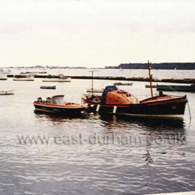 Rebuilt and placed on station at Poole, with the boarding boat on her stern. The last time I saw her she was a fishing boat in Holyhead with a cabin built on her.        Info and photograph from Bob Williams 2008.