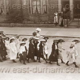 Children from the National School in Church Street walking up Marlborough Street on their way to Sunday School treat in the dene. (Dalton le Dale ) 1910