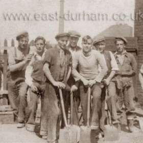 This photograph shows a very young George (Tucker) Wilson aged 19/20 yrs at second left and Micky Farrel far right. This gang were repairing the St Cuthbert's school yard at New Seaham in 1937/38.
Info from Brian Scollen, photo sent in by 'Alan'