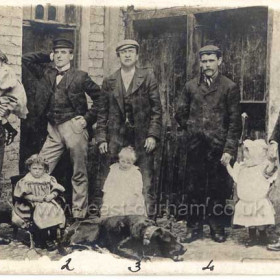 Rear of photograph reads.....
1 Mr Harrison, proprieter of the Theatre Royal, Seaham Harbour & his two children.  2 James English and his cigarette.     
3 Mr Bock Pylade, his child and dog.      
4 The stage carpenter.       
5 The professional butcher.    
This group was taken one summer morning in the year of 1886.    
With sincere best wishes to Miss Mabel Goff from James English 30-9-08.