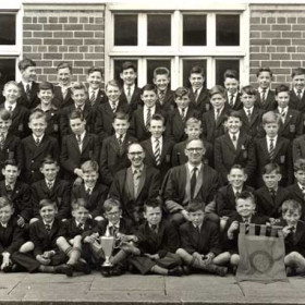 Ryhope Robert Richardson Grammar School choir 1961.           
This choir won the North of England boys choir competition at Newcastle City Hall. The musical director was Oswald (Ozzi) Fox who played the organ at Christ Church. Half of the choir came from the Seaham area (not surprising really as almost a third of the pupils at RRRGS were from Seaham thanks to Mr Henderson, headmaster of Dawdon Junior Boys (DA)) 
Back Row L to R; Pratt, ?, ?, Walker, ?, ?, ?, Mayhew, ?, Shepherd, ?, ?.
2nd Row; John McCormack, ?, ?, ?, ?, ?, ?, ?, Willcox, ?, ?, Phillips.
3rd Row; ?, Jennings, ?, Mariner, Joiner, Chaytor, Laver, Brydon, ?, ?, Ferguson.
4th Row; ?, Campbell, ?, Whitehead, Taylor, Fox, Williams, Spence, Rose, ?, ?, Robert Hunter.
Front Row; Smith, Hall, Miller, ?, Taylor, Readman, Heckles, Shepherd, Heckles, Wilson, ?, ?.
There are three sets of brothers here, Taylor, Shepherd and Heckles, all from Seaham.      
Photograph and caption from Beatrice and Lee Whitehead.