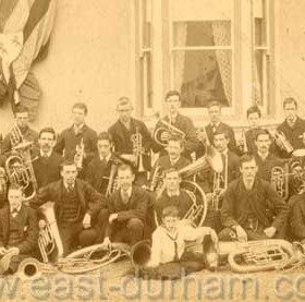 Bottleworks band on the occasion of Lord Londonderry becoming Viceroy of Ireland in 1886. The man at centre of the front row, behind boy, is William Reed who died of Typhoid in 1897 aged 33.