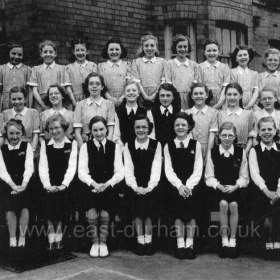 Seaham Harbour Girl's Grammar School, Princess Rd. 
Class 1 Summer term 1951
L to R Back Row; 
Pat Jackson, Margaret Carr, Jean Coupland, Marjorie Lamb, Anne Greener, Pat Bowers, Avril Jones, Jean Campbell, Maureen Dodsworth.
Middle Row;
Miss Stokoe (form teacher) Anne Beamson, Carole Hooper, Vera Brown, Joan Dobson, Molly Dowson, Joyce Harrison, Lorna Featonby, Margaret Gustard, Judy Leonard, Yvonne Galilee, Hilda Johnson.
Front Row;
Barbara Barkess, Sheila Lauder, Jill Dixon, Joan Gray, Joan Brown, Ada Gallagher, Rebe Ann Croft, Jean Griffiths, Audrey Fletcher.
Photograph and caption from J Elliot