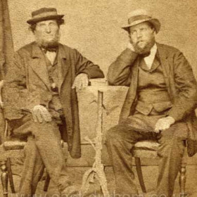 Studio shot of a couple of characters c1880