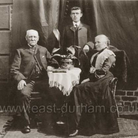 Photograph taken in the back yard of Sergeant Proud (policeman) at 1 Swinebank Cottages, 1904
L to R; Frank Anderson (father) John Francis Anderson (son) Elizabeth Anderson (mother)
I believe the correct names are Francis Anderson (father) and Isabella Anderson (mother)
Photograph from John and Ken Anderson
Do you have any photographs which show this street?