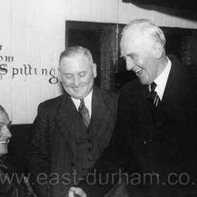 Toc H building, Strangford Road 1950s.
L to R; John Francis Anderson,  Councillor Burrows, Lord Lawson of Durham.
Love the sign.