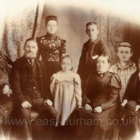 Kirby family in 1898.
L to R; Alfred Ernest, William, Elizabeth Jane, Dorothy Annie, John, Mary Jane, George William (dead), Henry.
Photograph from William Kirby