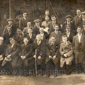 Group of Seaham men.
Photograph from Fiona Webster.
Fiona believes the man in the front row wearing the light overcoat is her grandfather. do you recognise anyone in the photograph?