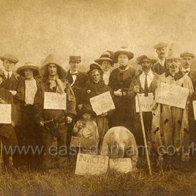 Probably the staff of the Invicta Picture House, Co-operative Hall, Vane Terrace c1910.
Apart from the black chap "from Riop" at left other readable cards show "Terrible Turk", " Kowboy from Dawdon", "Wild Man from Murton", "Mecksican from the Nak", "Kloun from H Invicta", "Tightrope Walker from Vinegar 'Ill".
The card at front reads INVICTA CIRCUS.