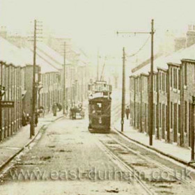 Station Rd, Hetton le Hole, c 1910.  This is almost exactly the same view as in HET 003, but after the tramway was built and before it was lifted or tarmaced over.   Caption by Sheldon Clark