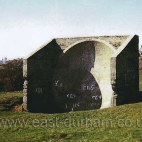 Ivor Parrington's photograph of the Seaham Sound Mirror taken in 1976. These huge concrete mirrors were sited along the coast to give advance warning of attacks by German Zeppelins during WW1. This one was situated in "The Hollow" on the bank-side behind the farm at the northern end of the Times Inn bank.