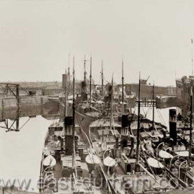 Seven ships of the Londonderry Line, instantly recognisable by the ' dangling carrot ' funnel markings, in the North Dock. The Viscount Castlereagh at left.
Probably around or just before 1900